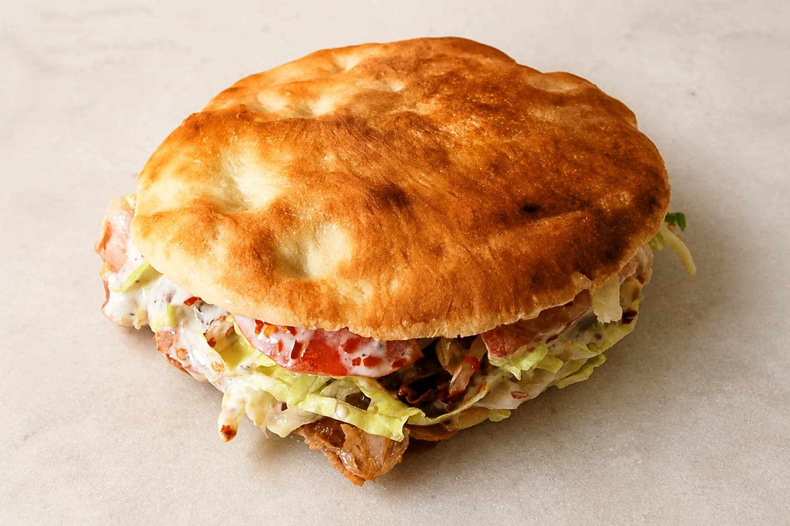 Kebab served in golden pita bread