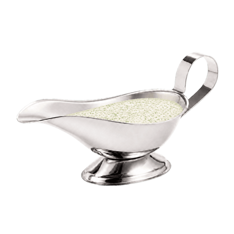 White herb sauce in a sauce boat